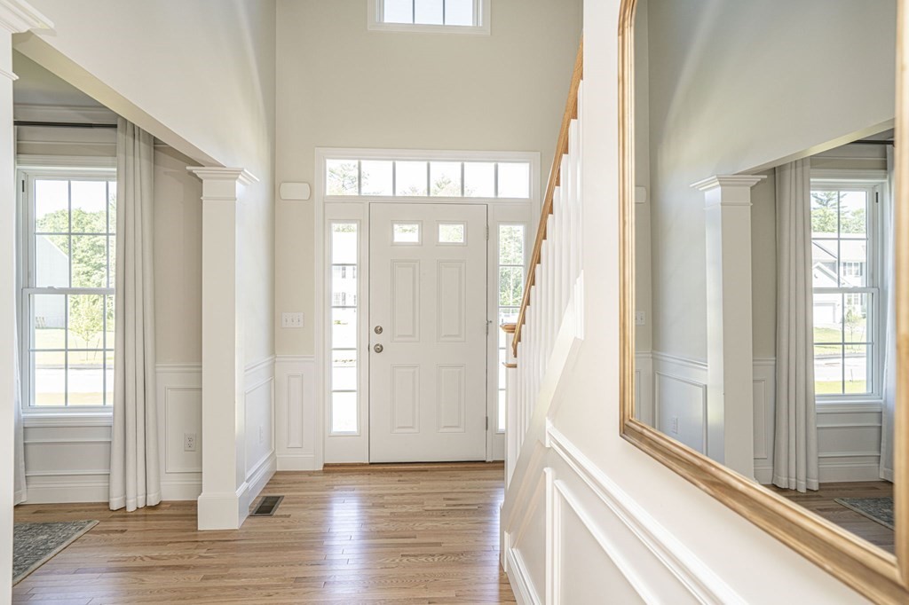 33 Clapp Road Rochester, MA 02770 - Photo 3 of 19 a view of a livingroom with wooden floor and windows