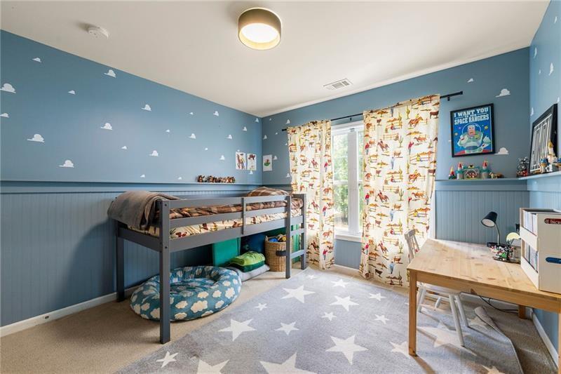 4970 Creekside Lane Powder Springs, GA 30127 - Photo 24 of 45 a living room with furniture and a table