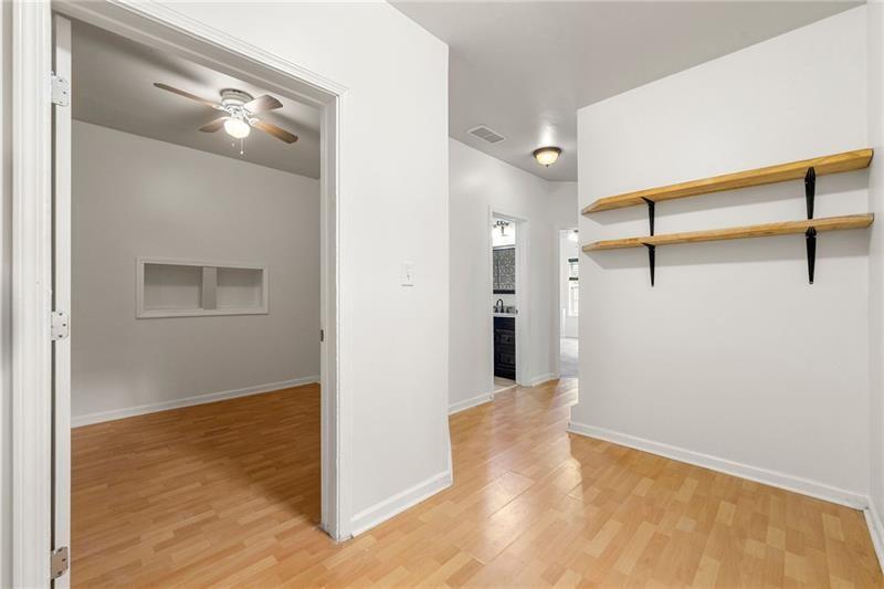 4970 Creekside Lane Powder Springs, GA 30127 - Photo 32 of 45 a view of a room with wooden floor and cabinet