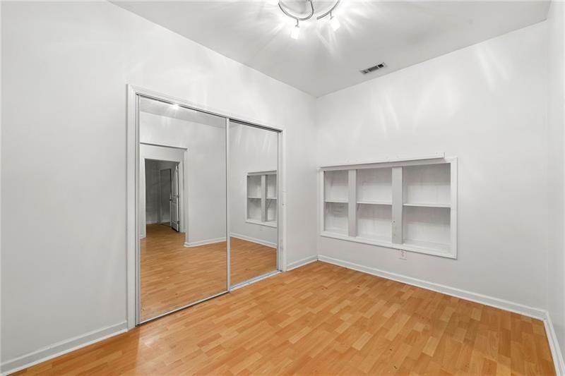4970 Creekside Lane Powder Springs, GA 30127 - Photo 38 of 45 an empty room with windows and closet