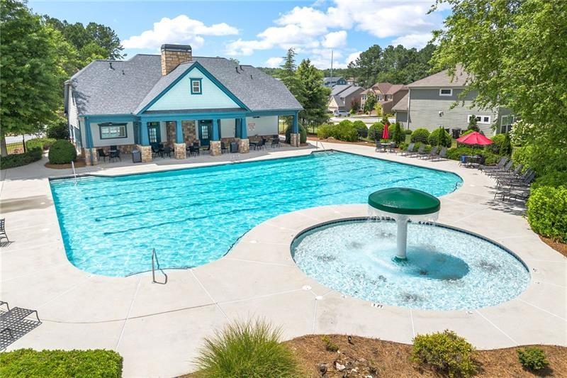 4970 Creekside Lane Powder Springs, GA 30127 - Photo 44 of 45 a view of a house with a swimming pool