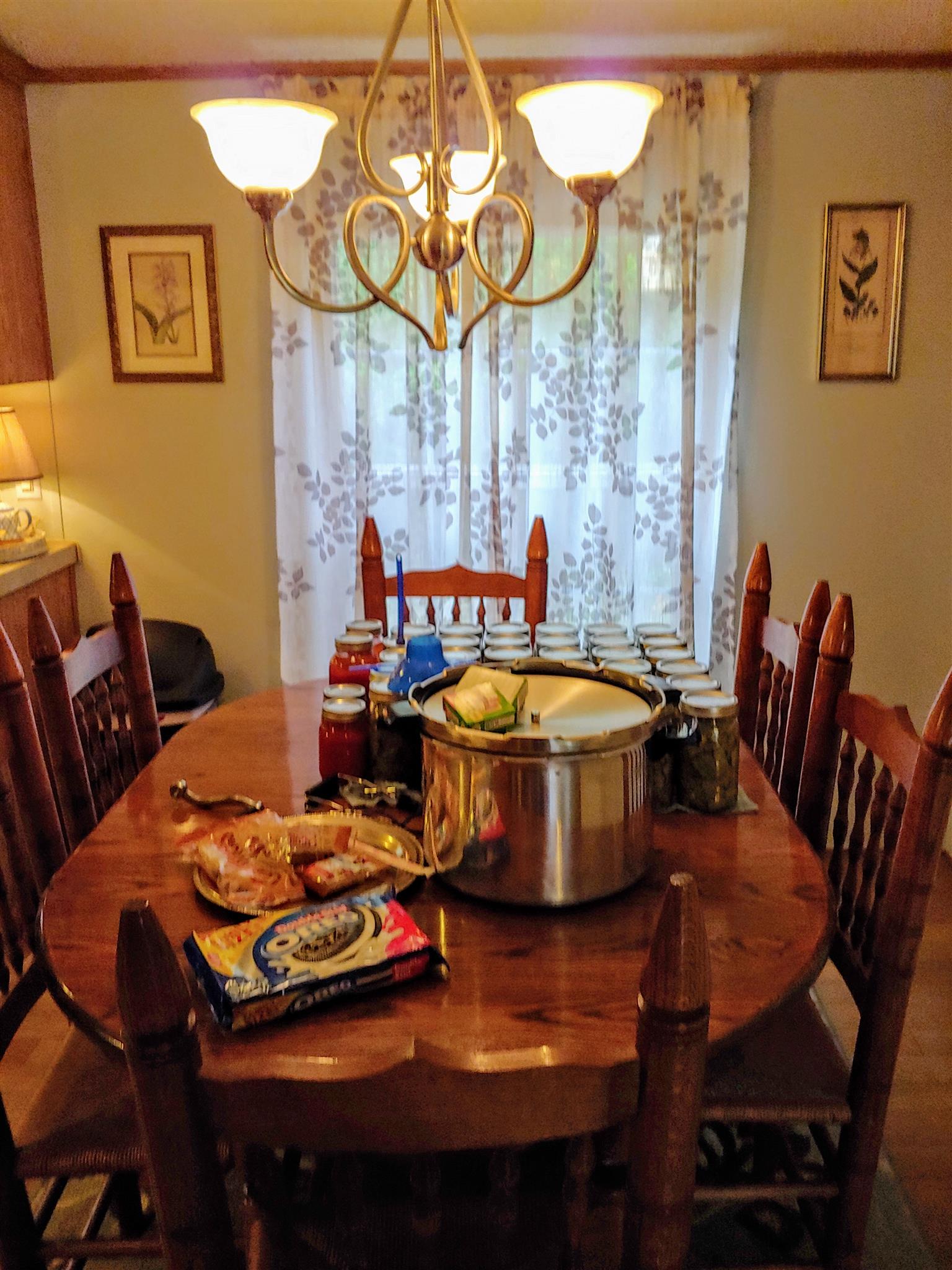 1235 Cunningham Road Readyville, TN 37149 - Photo 16 of 30 a dining room with furniture and a chandelier