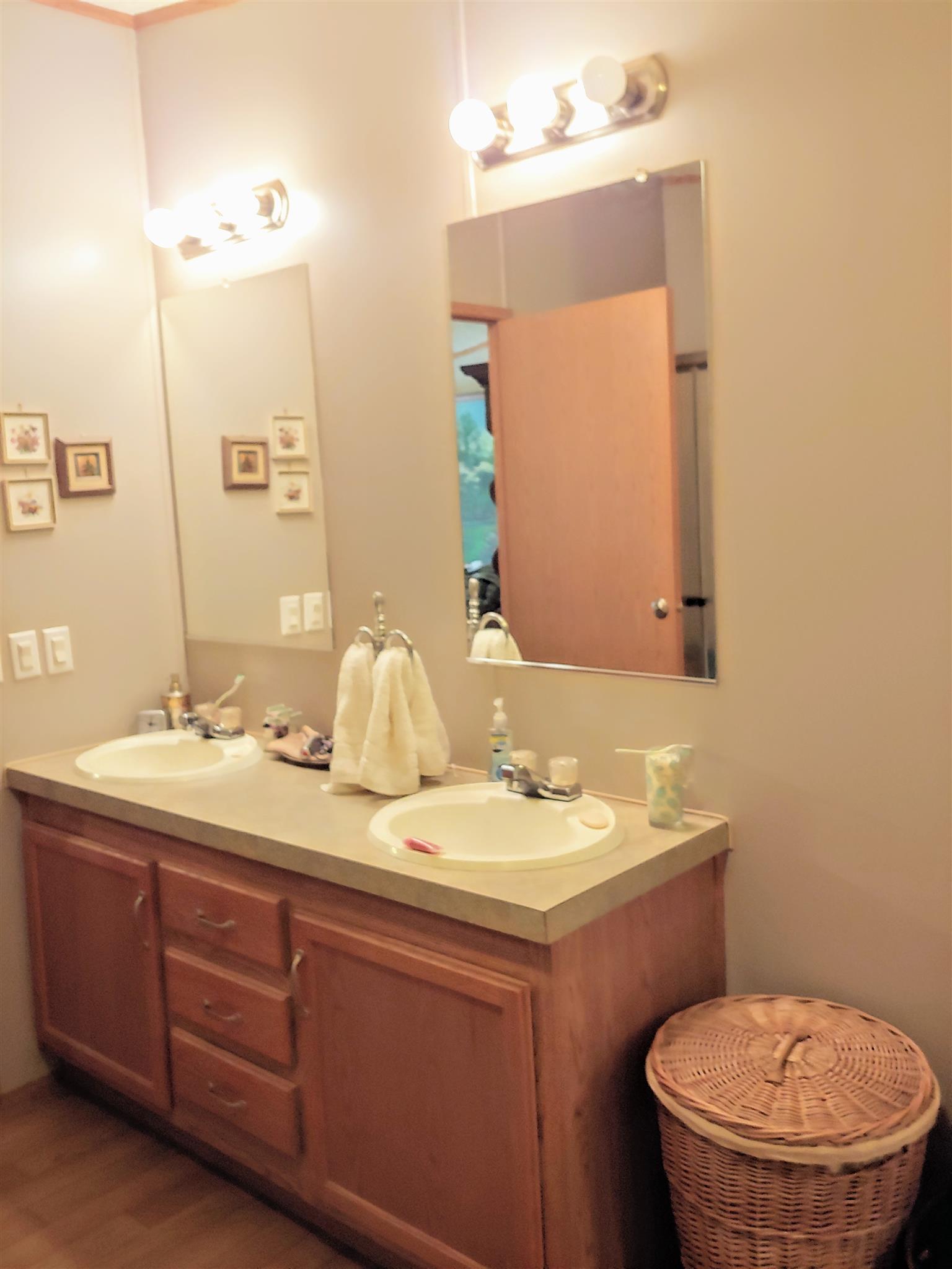 1235 Cunningham Road Readyville, TN 37149 - Photo 21 of 30 a bathroom with a granite countertop sink and a mirror
