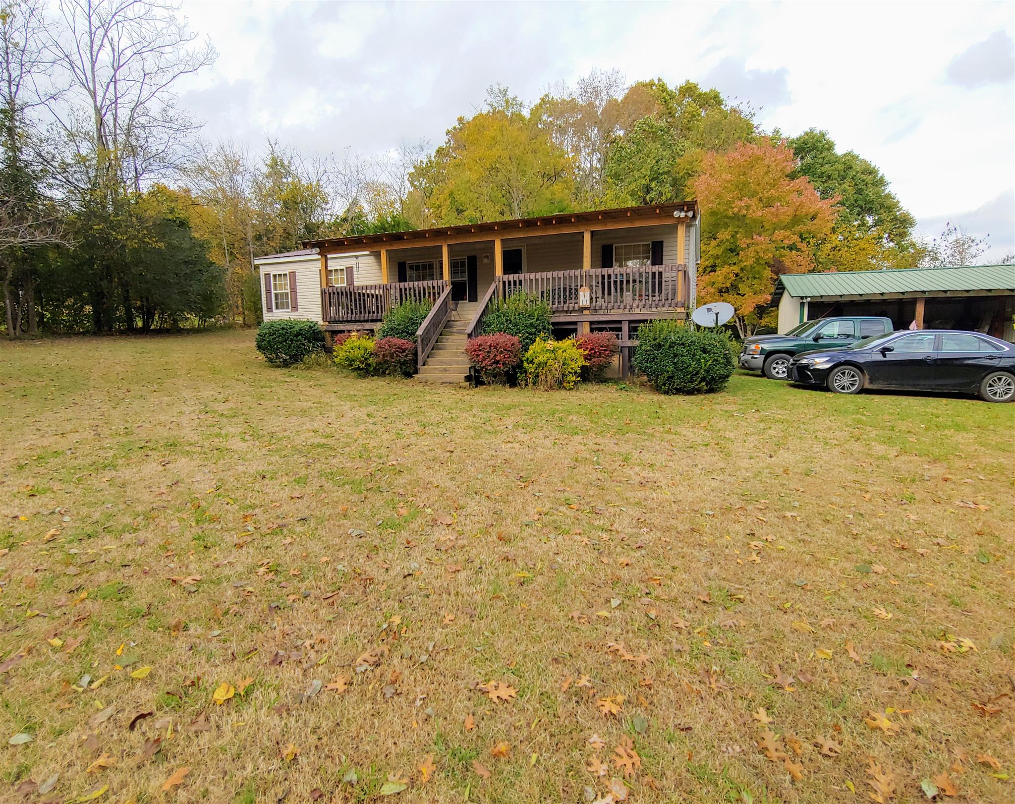 1235 Cunningham Road Readyville, TN 37149 - Photo 30 of 30 a front view of a house with garden