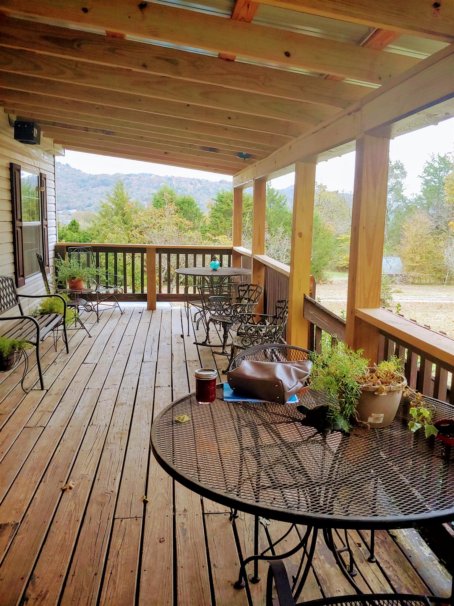 1235 Cunningham Road Readyville, TN 37149 - Photo 6 of 30 a view of a balcony with wooden floor
