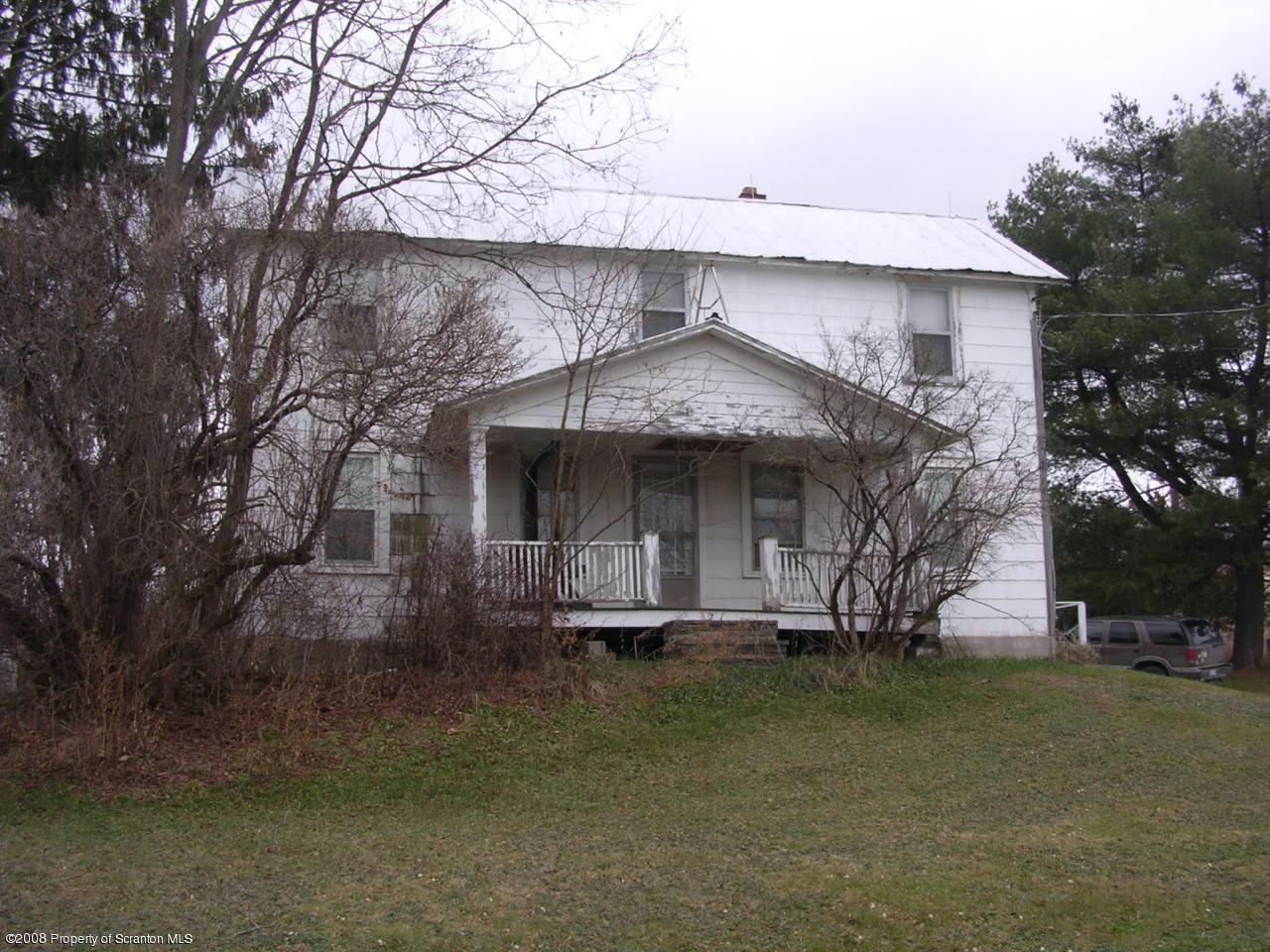 3 Rr Meshoppen, PA 18630 - Photo 1 of 6 a front view of a house with a yard