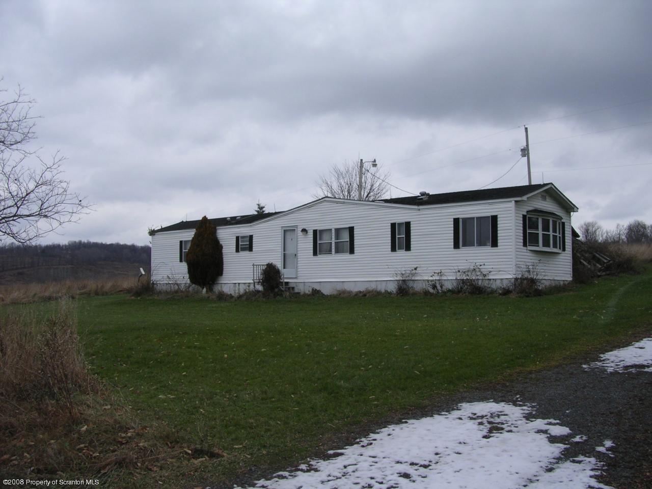 3 Rr Meshoppen, PA 18630 - Photo 2 of 6 a front view of a house with garden