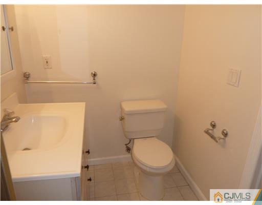 4 Paddock Court Edison, NJ 08820 - Photo 12 of 23 a bathroom with a toilet and a shower