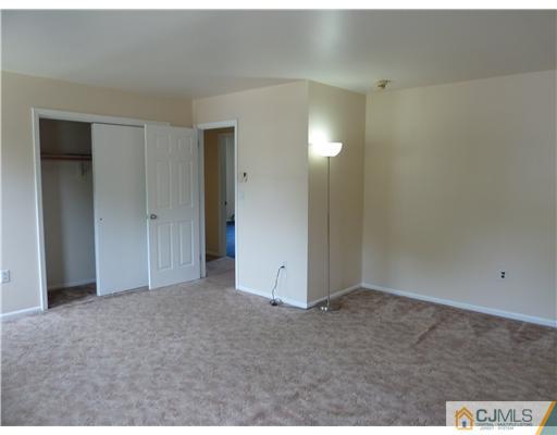 4 Paddock Court Edison, NJ 08820 - Photo 14 of 23 a view of an empty room