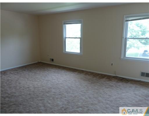 4 Paddock Court Edison, NJ 08820 - Photo 15 of 23 an empty room with a window