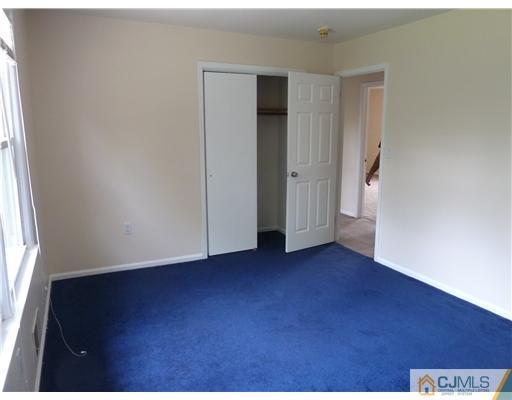 4 Paddock Court Edison, NJ 08820 - Photo 18 of 23 an empty room with windows