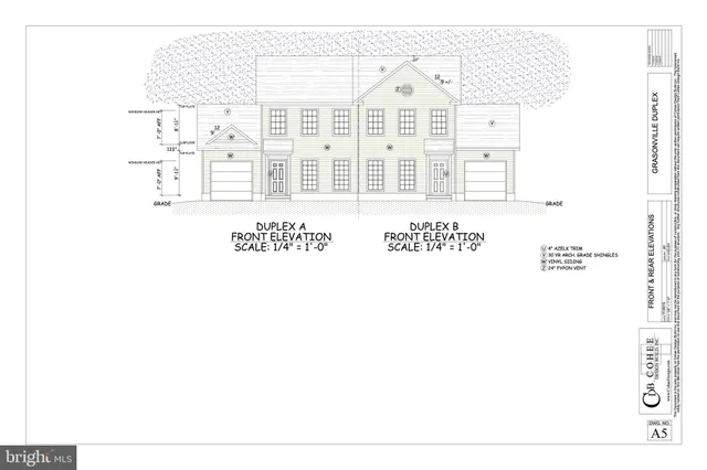 a picture of a bench in front of a building