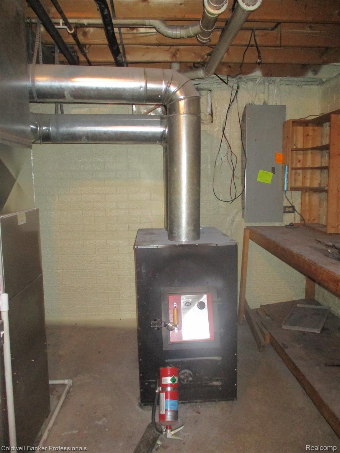 8818 Irish Road Millington, MI 48746 - Photo 22 of 27 Wood Stove.JPG