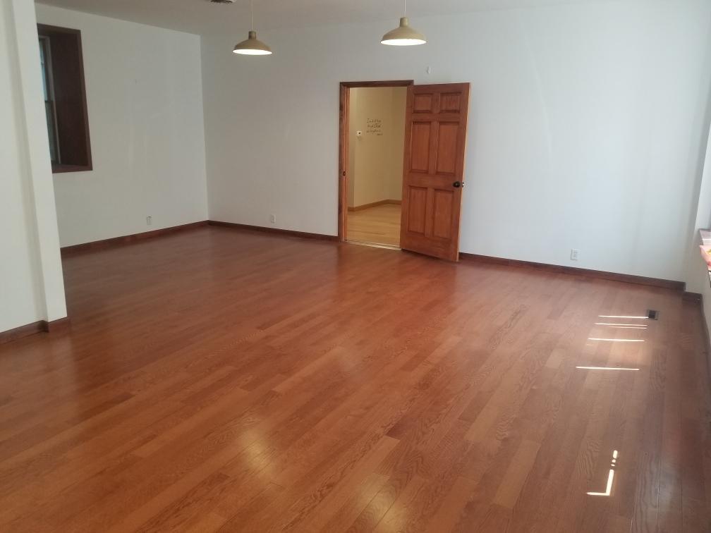 801 2nd Street LaSalle, IL 61301 - Photo 9 of 9 an empty room with wooden floor and windows