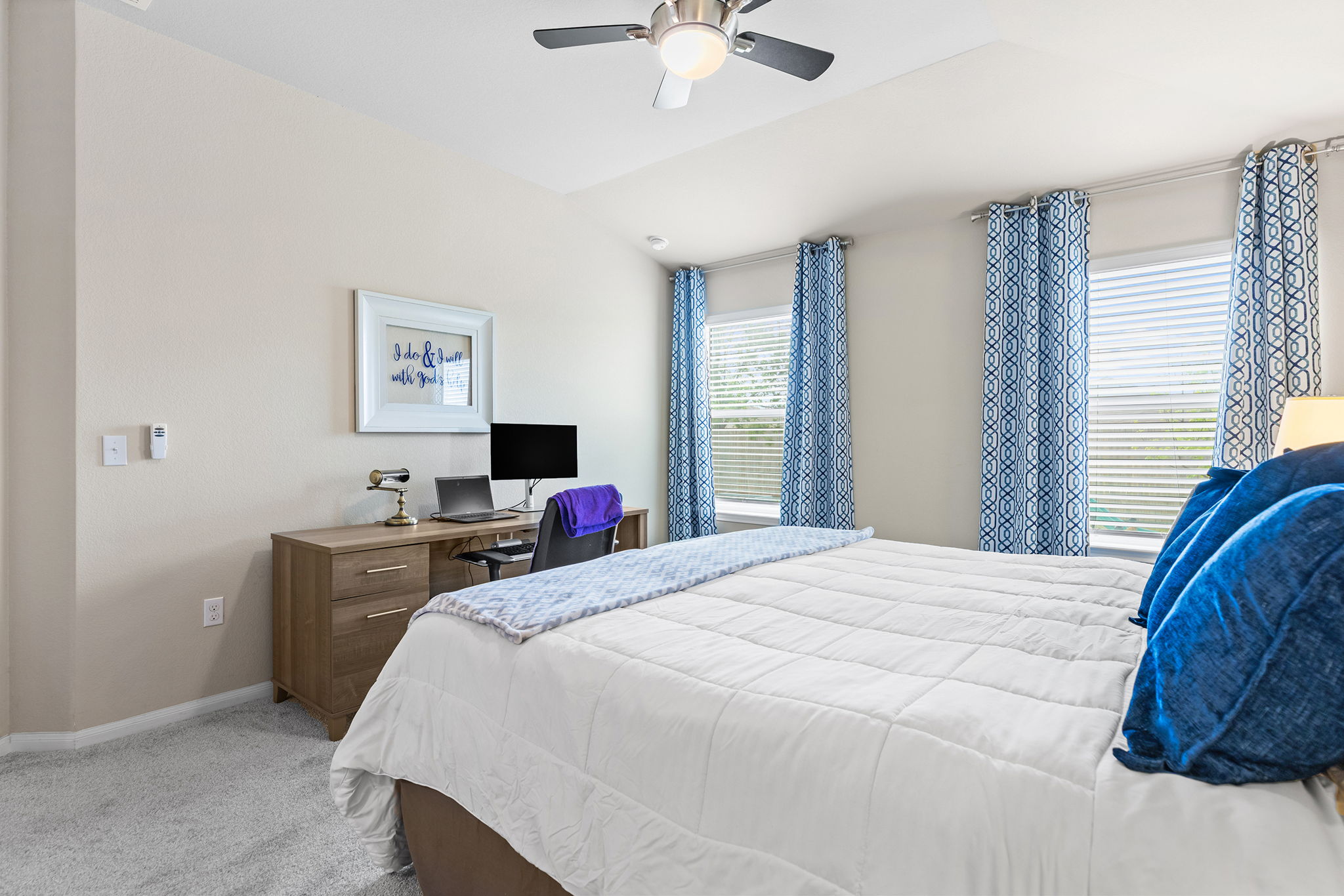 404 Cassandra Drive Hutto, TX 78634 - Photo 17 of 40 Bedroom with carpet flooring, a desk, vaulted ceiling, and ceiling fan