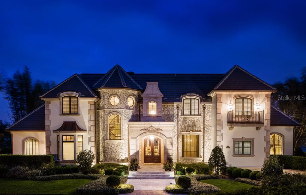 5018 Latrobe Drive Windermere, FL 34786 - Photo 1 of 1 Gracious living at its finest, this exquisite French chateau offers a prime location overlooking the beautiful Lake Bessie.