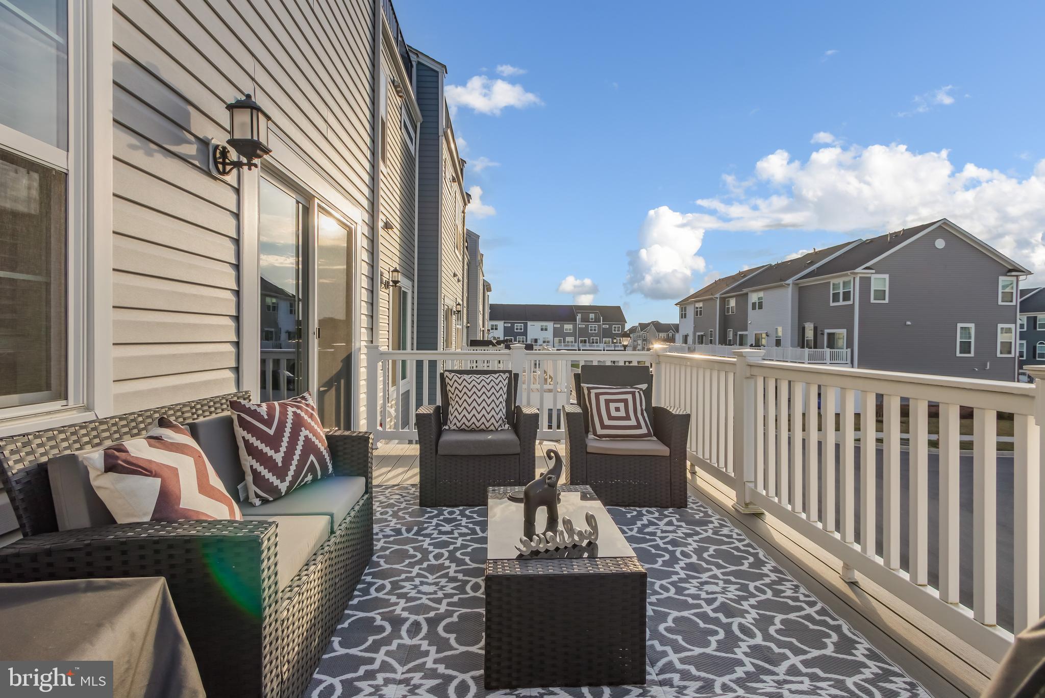 7806 Johnnycake Road Windsor Mill, MD 21244 - Photo 14 of 28 Full Size Deck off Living Area (Furniture Conveys)