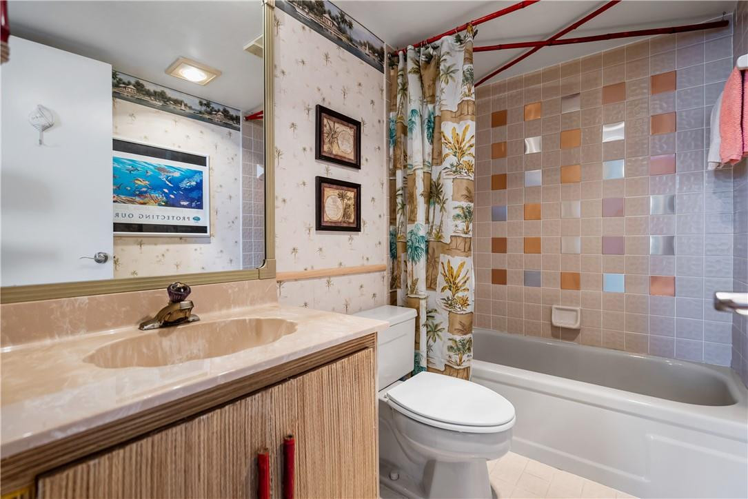 701 North Riverside Drive, Unit 403 Pompano Beach, FL 33062 - Photo 19 of 40 Guest room with bathroom.