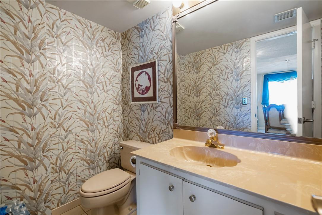 701 North Riverside Drive, Unit 403 Pompano Beach, FL 33062 - Photo 21 of 40 Half bath.