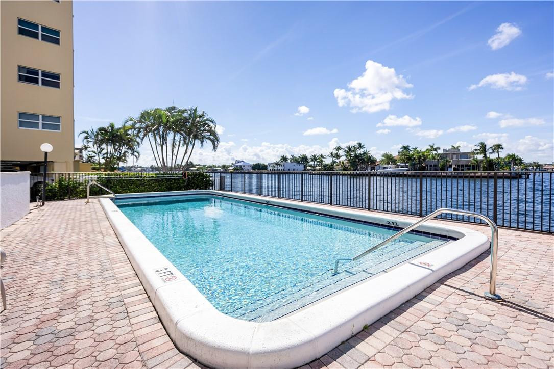 701 North Riverside Drive, Unit 403 Pompano Beach, FL 33062 - Photo 28 of 40 Heated pool.