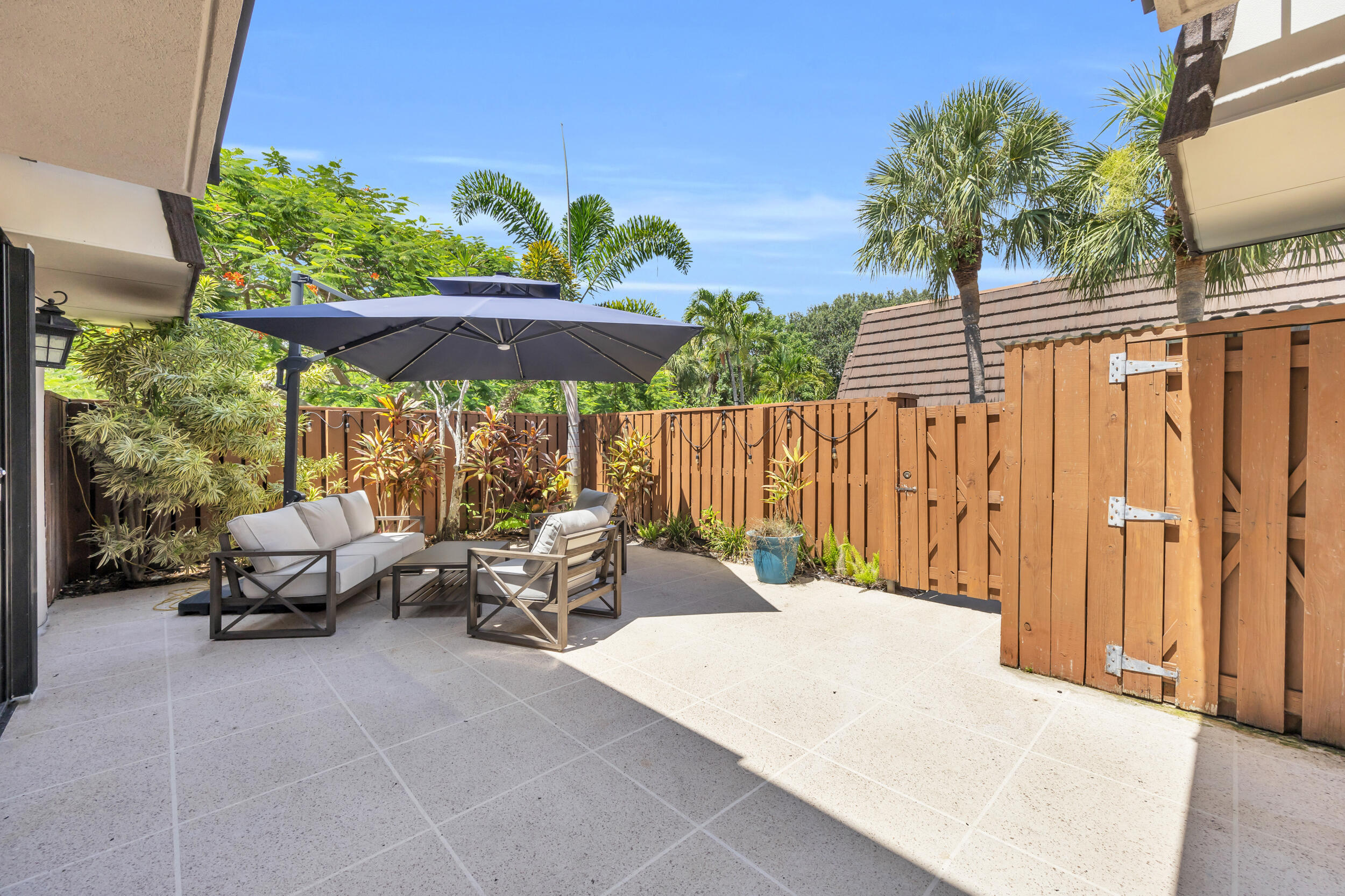 1208 12th Court Jupiter, FL 33477 - Photo 12 of 31 a view of outdoor space yard and patio