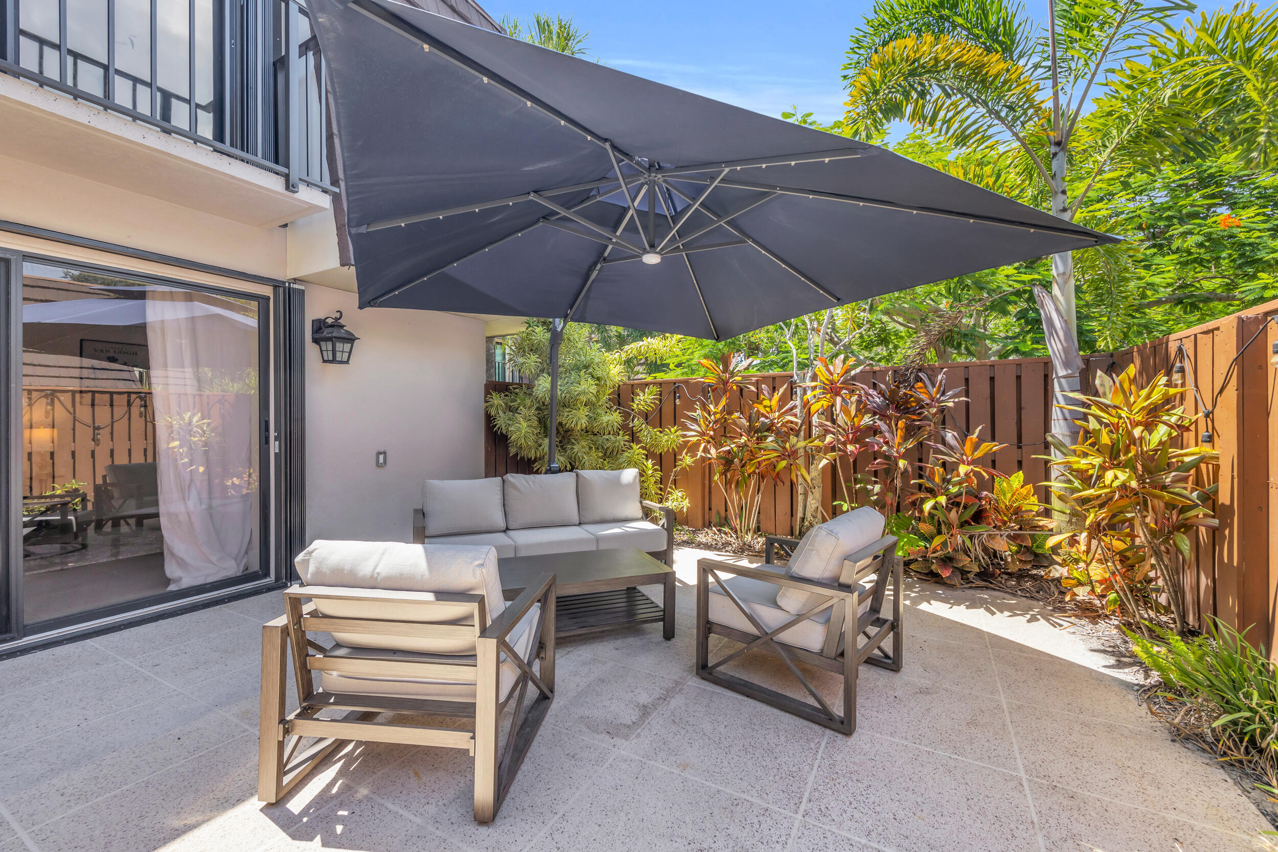 1208 12th Court Jupiter, FL 33477 - Photo 13 of 31 a patio view with patio