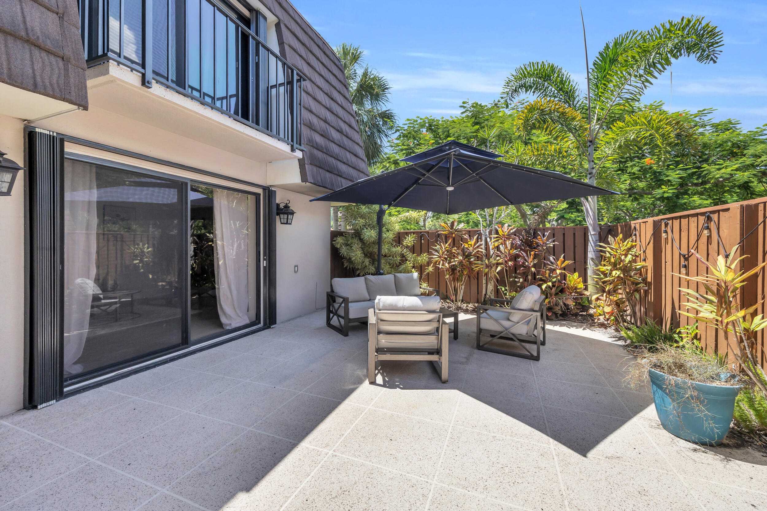 1208 12th Court Jupiter, FL 33477 - Photo 16 of 31 a view of outdoor space yard and patio