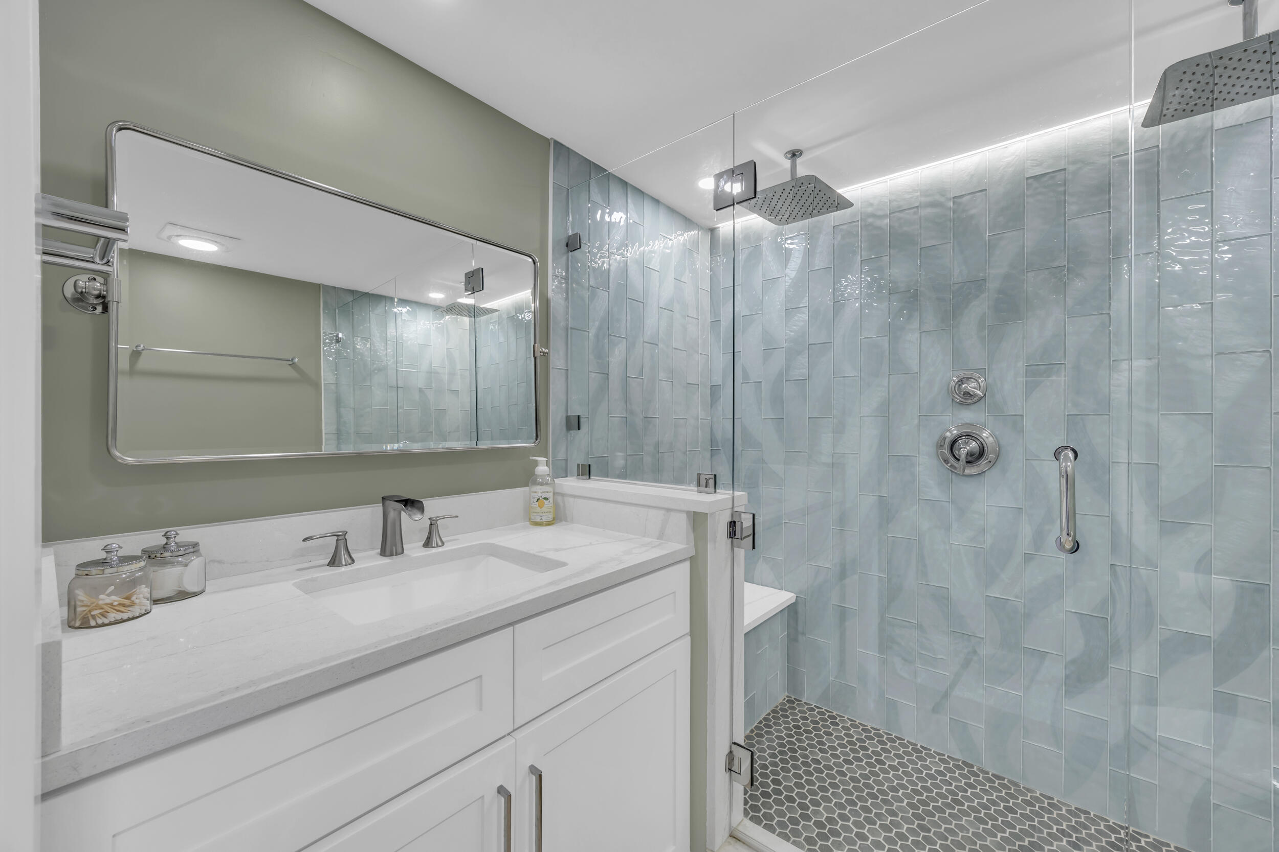 1208 12th Court Jupiter, FL 33477 - Photo 21 of 31 a bathroom with a sink shower and a mirror