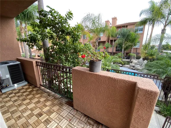a view of balcony with furniture