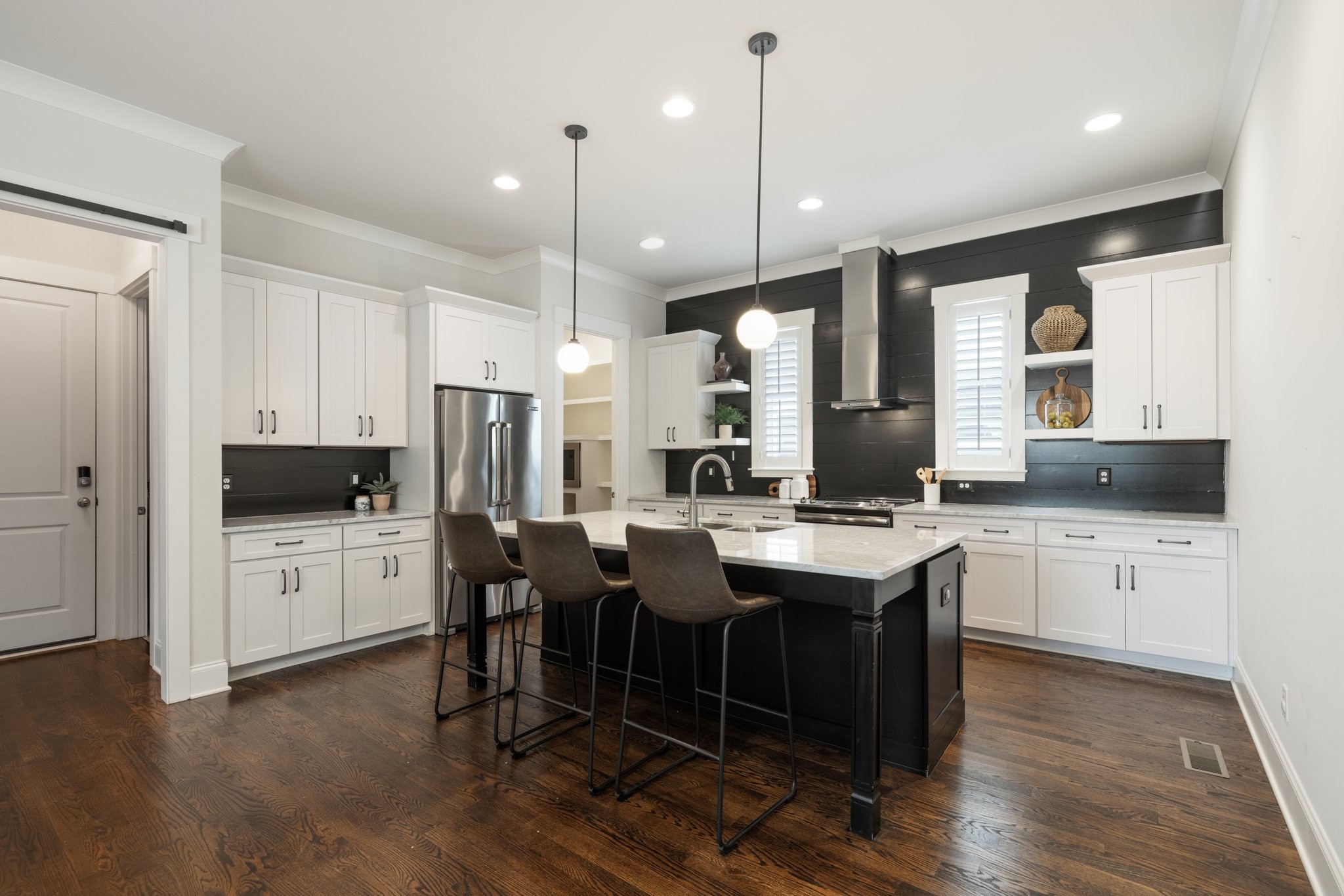 5543 Knob Road Nashville, TN 37209 - Photo 24 of 64 a kitchen with a sink cabinets and wooden floor