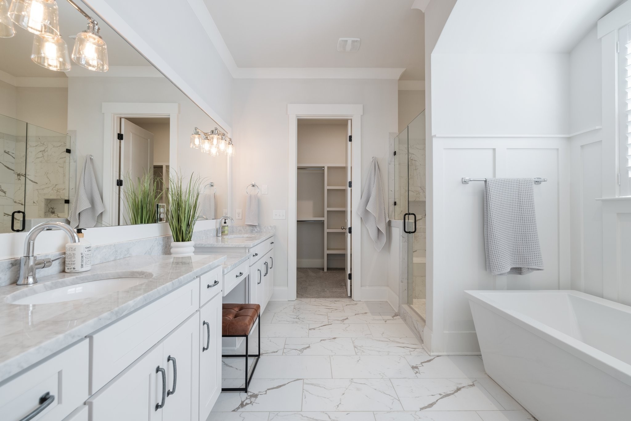 5543 Knob Road Nashville, TN 37209 - Photo 32 of 64 a bathroom with a granite countertop sink mirror and a bathtub
