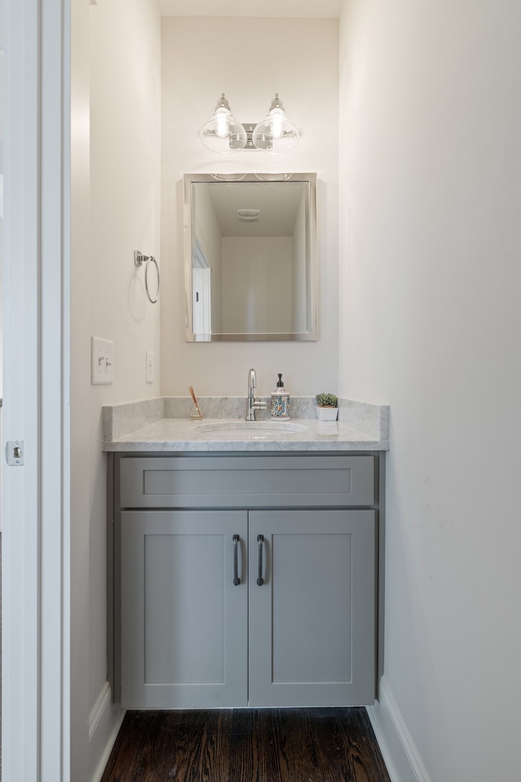 5543 Knob Road Nashville, TN 37209 - Photo 50 of 64 a bathroom with a sink vanity and mirror