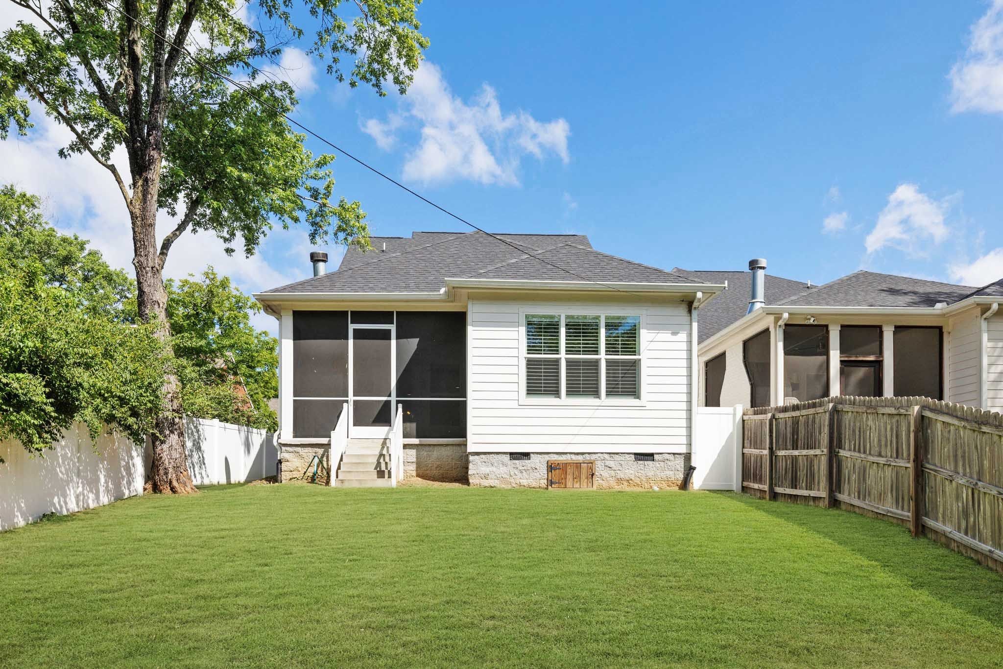 5543 Knob Road Nashville, TN 37209 - Photo 53 of 64 a front view of a house with a garden