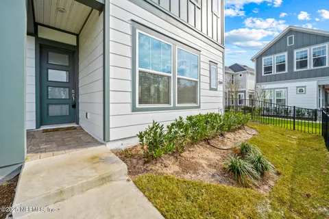 a view of a house with a swimming pool