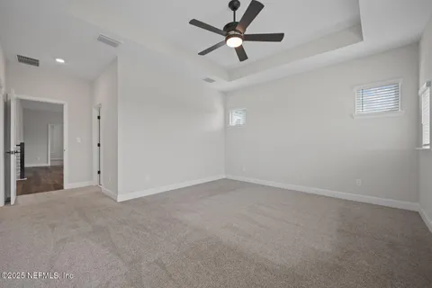 an empty room with fan