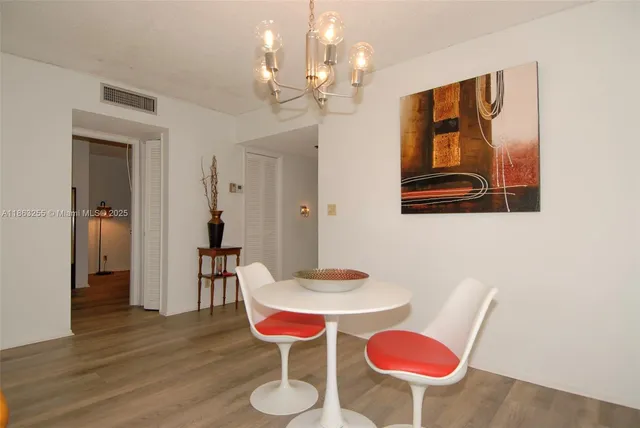a view of a dining room with furniture