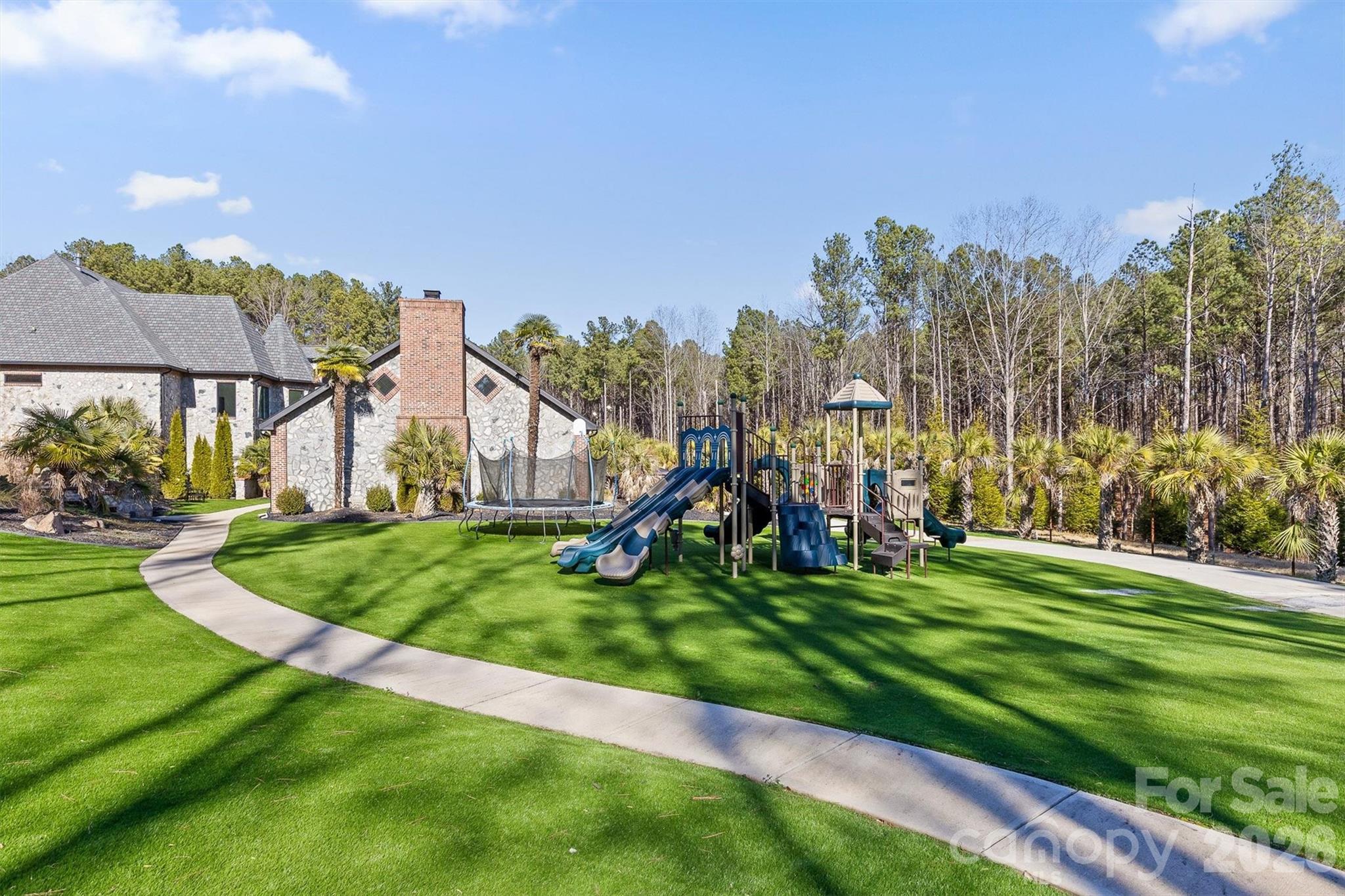 135 Stillwater Road Troutman, NC 28166 - Photo 32 of 43 a view of a park with large trees