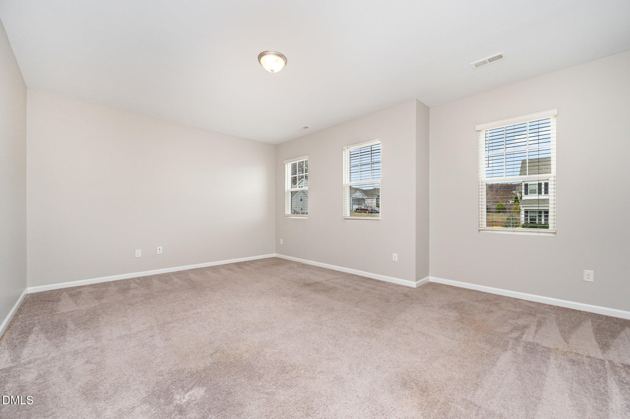 18 Dover Ridge Court Chapel Hill, NC 27517 - Photo 26 of 40 an empty room with windows