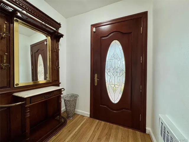a front view of a house with washer and dryer