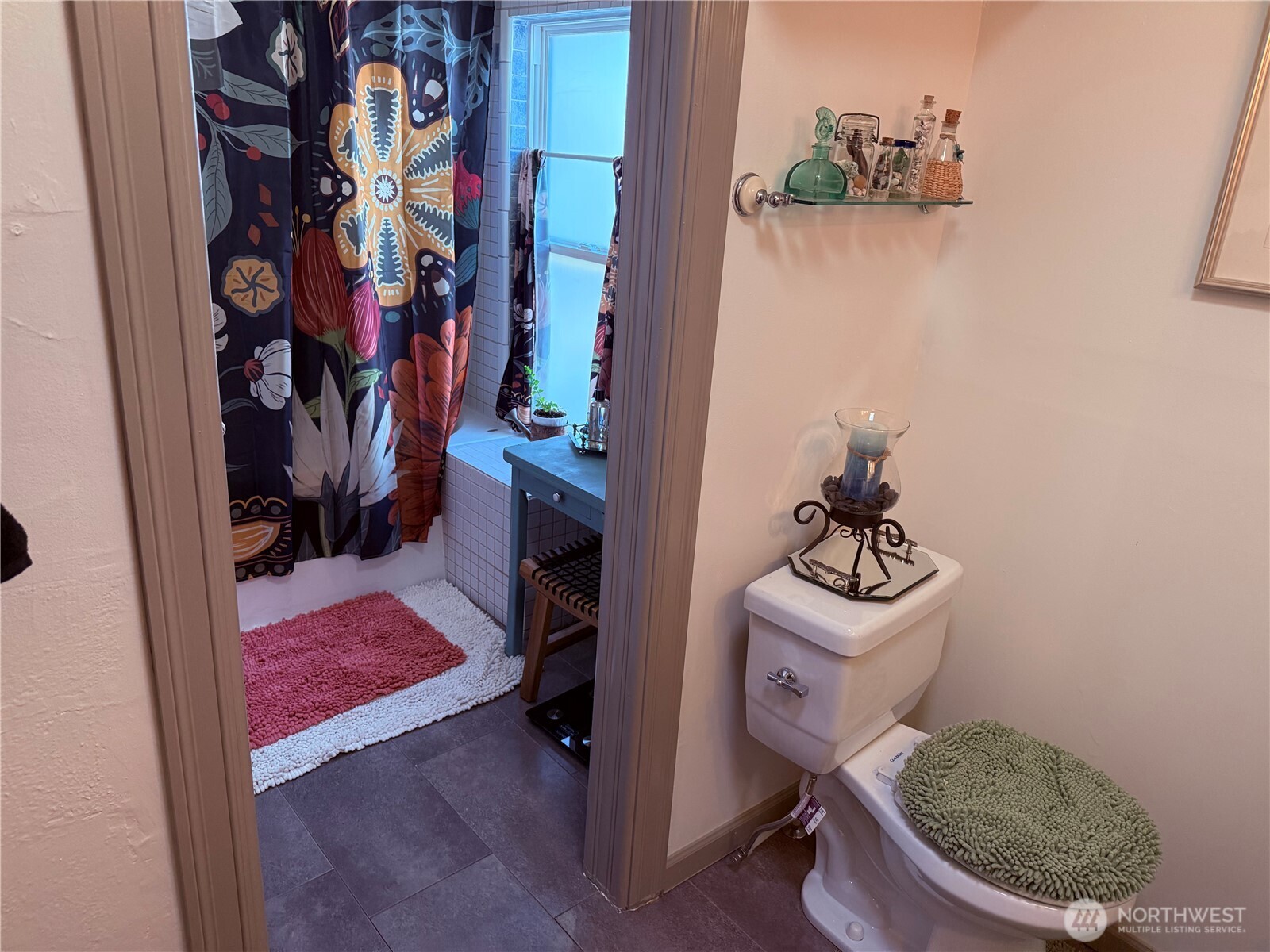 514 South Division Street Odessa, WA 99159 - Photo 20 of 40 a bathroom with a toilet and a shower curtain