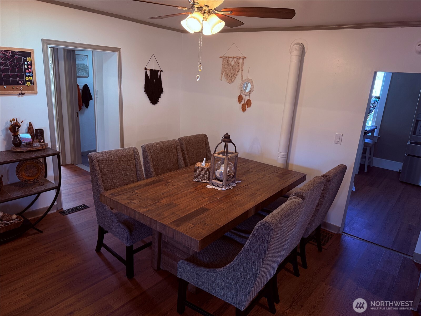 514 South Division Street Odessa, WA 99159 - Photo 8 of 40 a view of a dining room with furniture and wooden floor