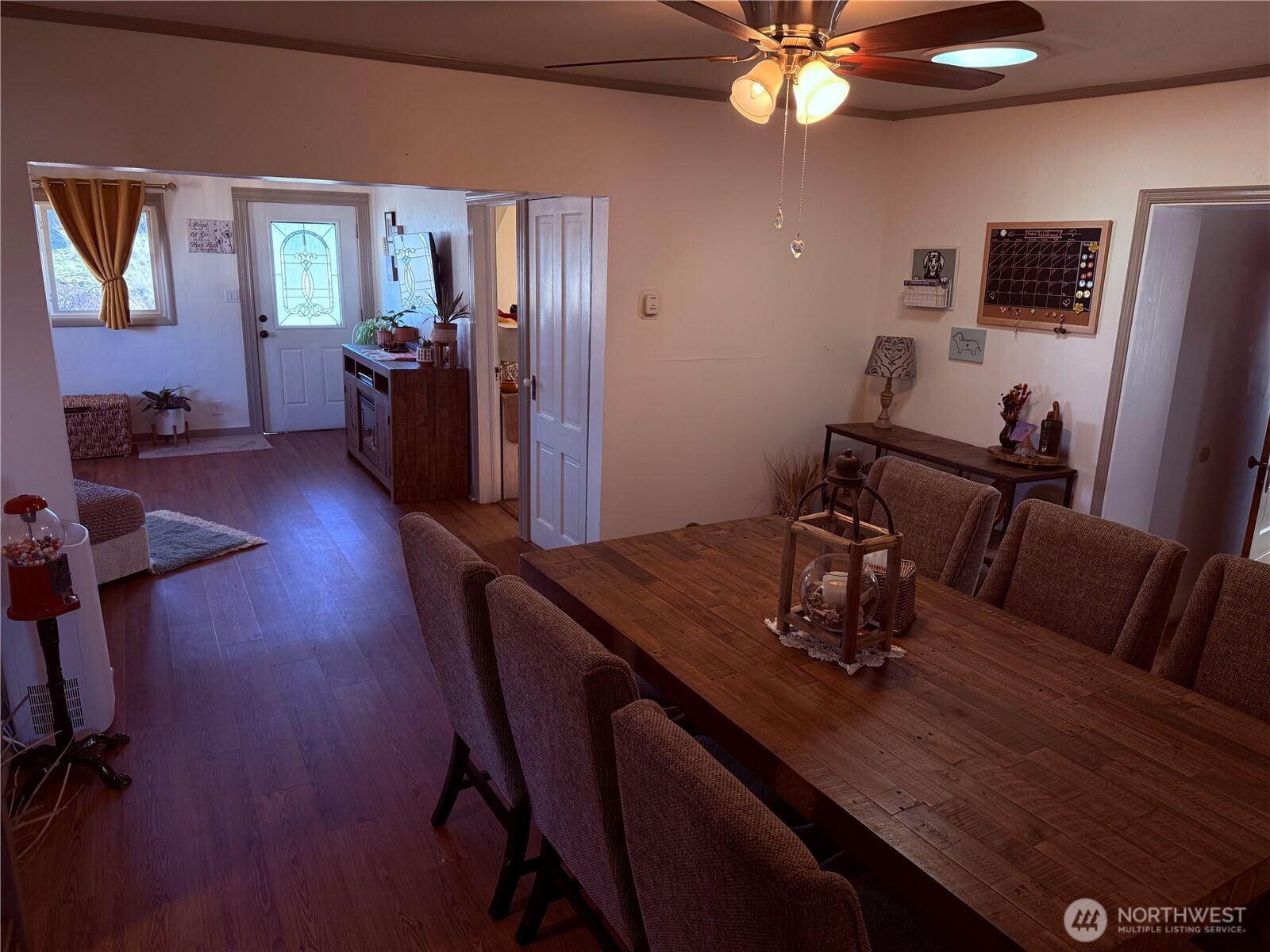 514 South Division Street Odessa, WA 99159 - Photo 10 of 40 a view of a dining room with furniture and wooden floor