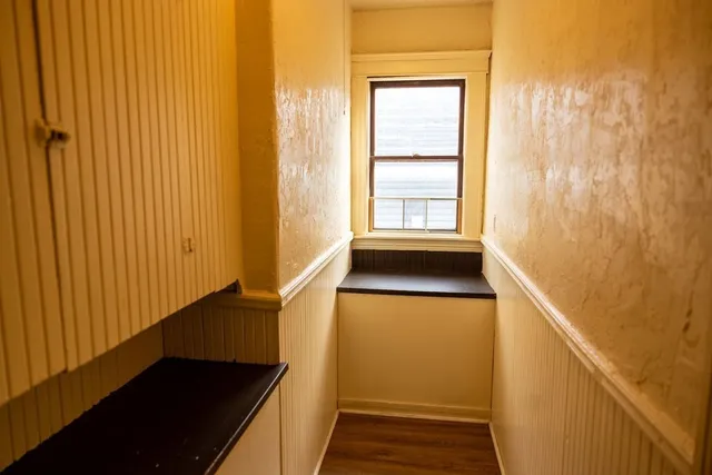 a view of a utility room with a window