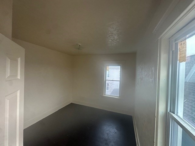 42 Dorcester, Unit 3 Worcester, MA 01604 - Photo 9 of 10 an empty room with windows