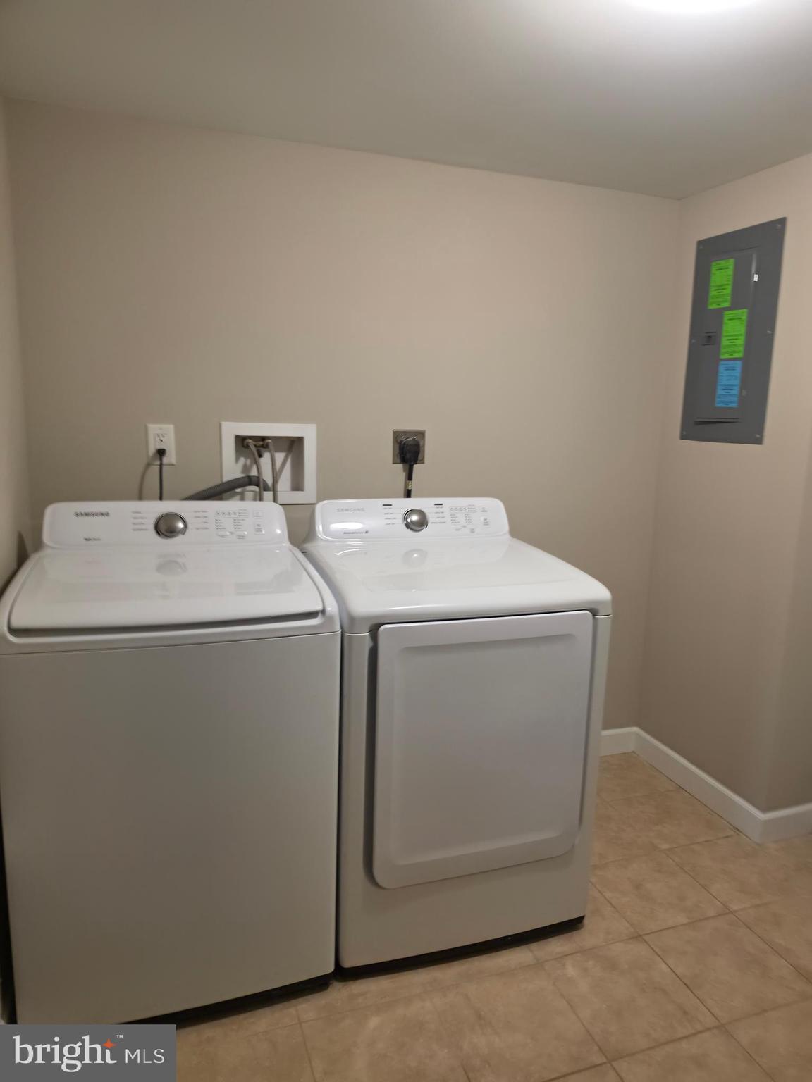 2028 Hillenwood Road Baltimore, MD 21239 - Photo 15 of 18 a utility room with dryer and washer