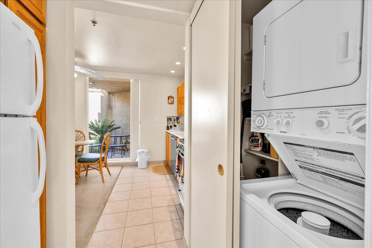 1555 North Chaparral Road, Unit 334 Palm Springs, CA 92262 - Photo 20 of 36 a view of a hallway with washer and dryer