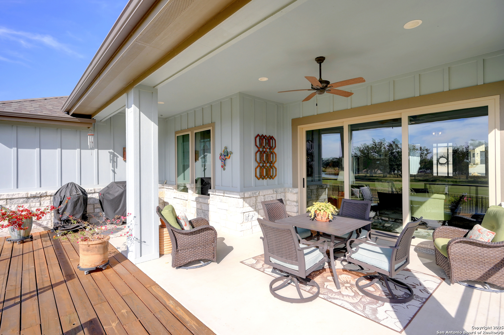 119 Hiram Cook Blanco, TX 78606 - Photo 17 of 20 a living room with patio furniture and a floor to ceiling window