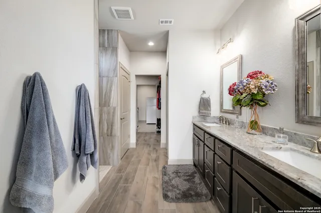 a bedroom with a bed chair and window