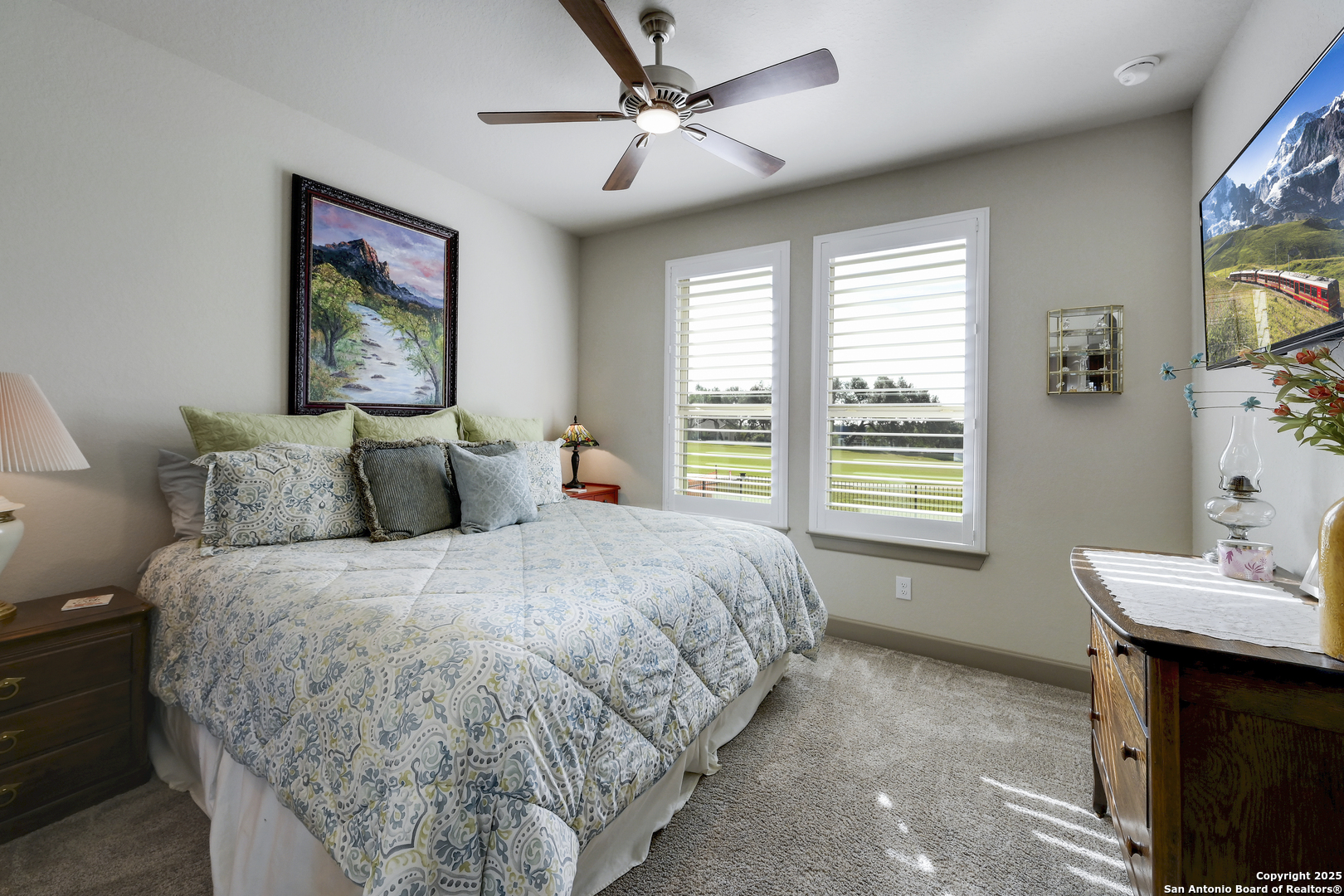 119 Hiram Cook Blanco, TX 78606 - Photo 10 of 20 a bed sitting in a bedroom next to a window