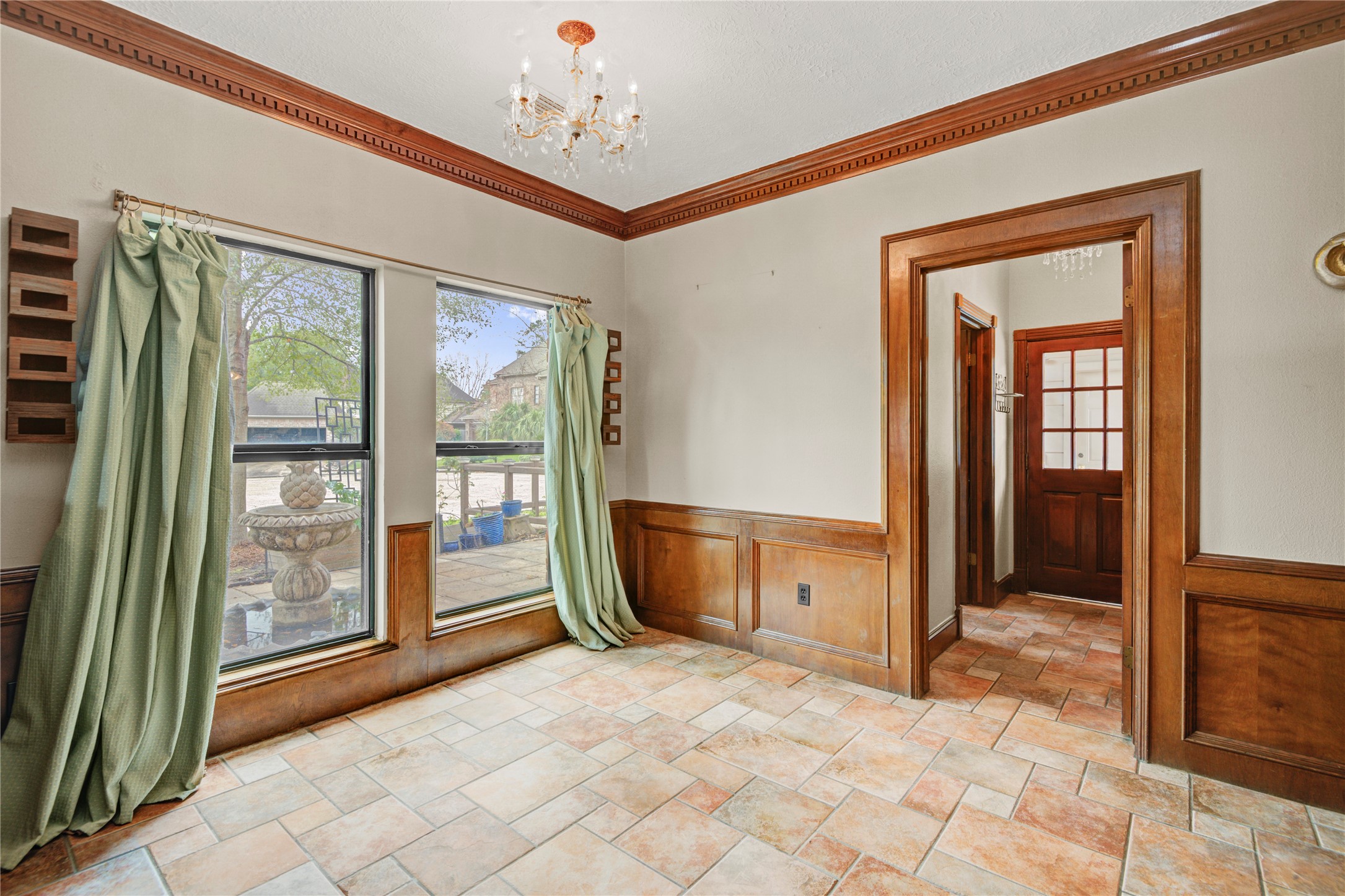 8412 Hidden Trail Lane Spring, TX 77379 - Photo 17 of 43 The bright breakfast area features large windows and French doors that bring in natural light while offering views of the patio and outdoor spaces.